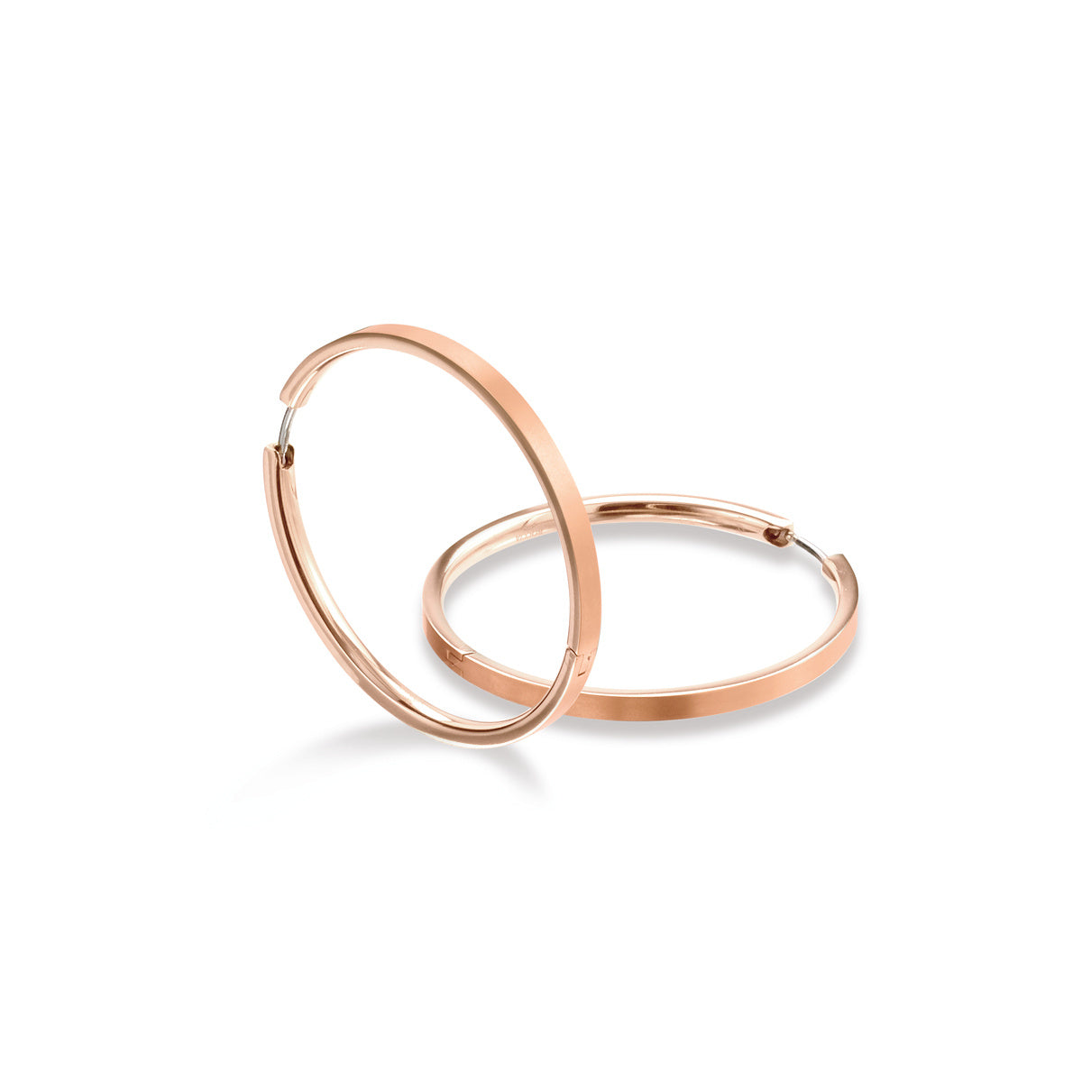 Boucles d'oreilles en titane avec finition rose doré, de forme ronde et élégante.
