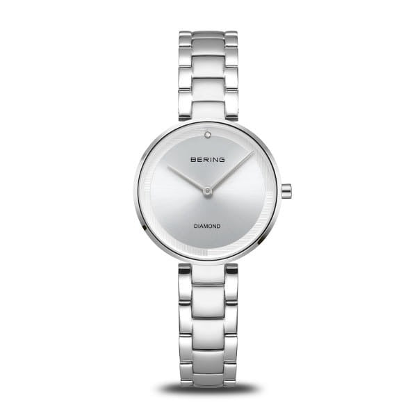Montre en acier inoxydable avec un cadran argenté et un bracelet à maillons.