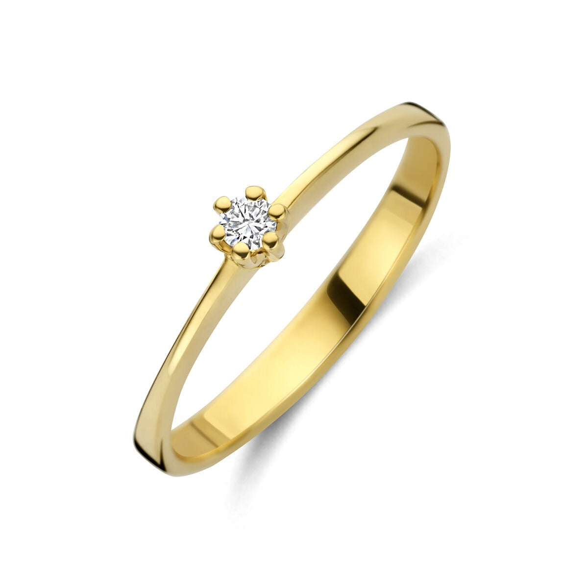 Bague en or jaune 14 carats avec un diamant lab grown en sertissage.