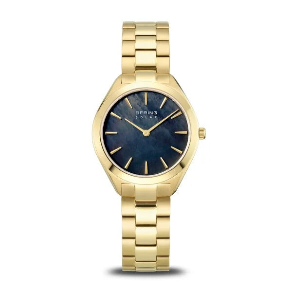 Montre femme Bering avec bracelet doré et cadran en nacre bleue.