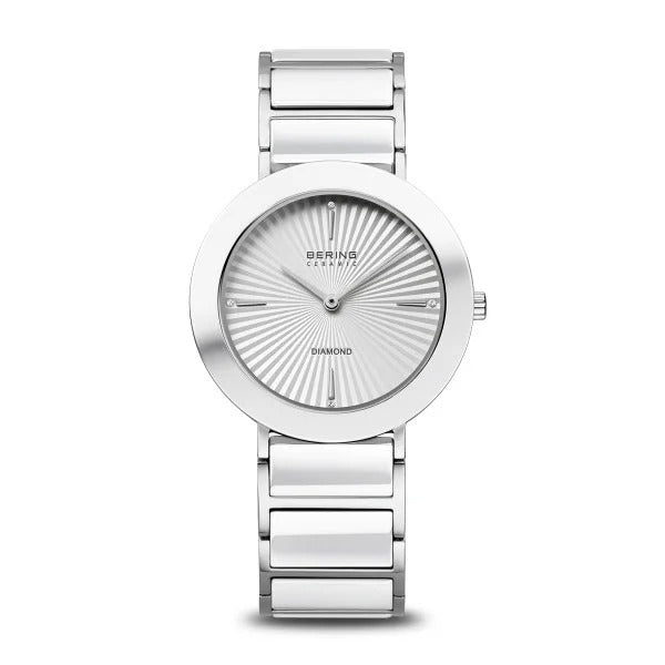 Montre femme Bering en céramique, argentée avec un cadran blanc et un bracelet en céramique.