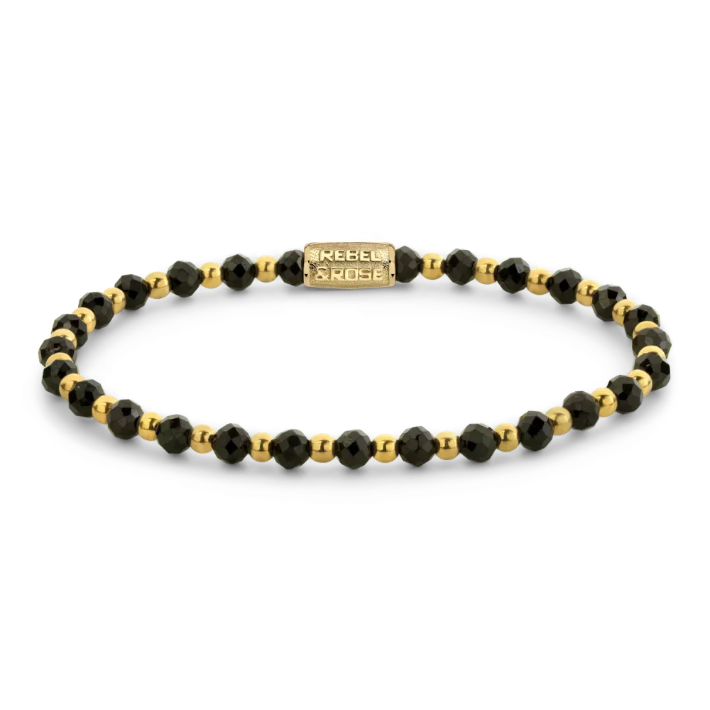 Bracelet en perles noires et dorées, avec fermoir en métal.