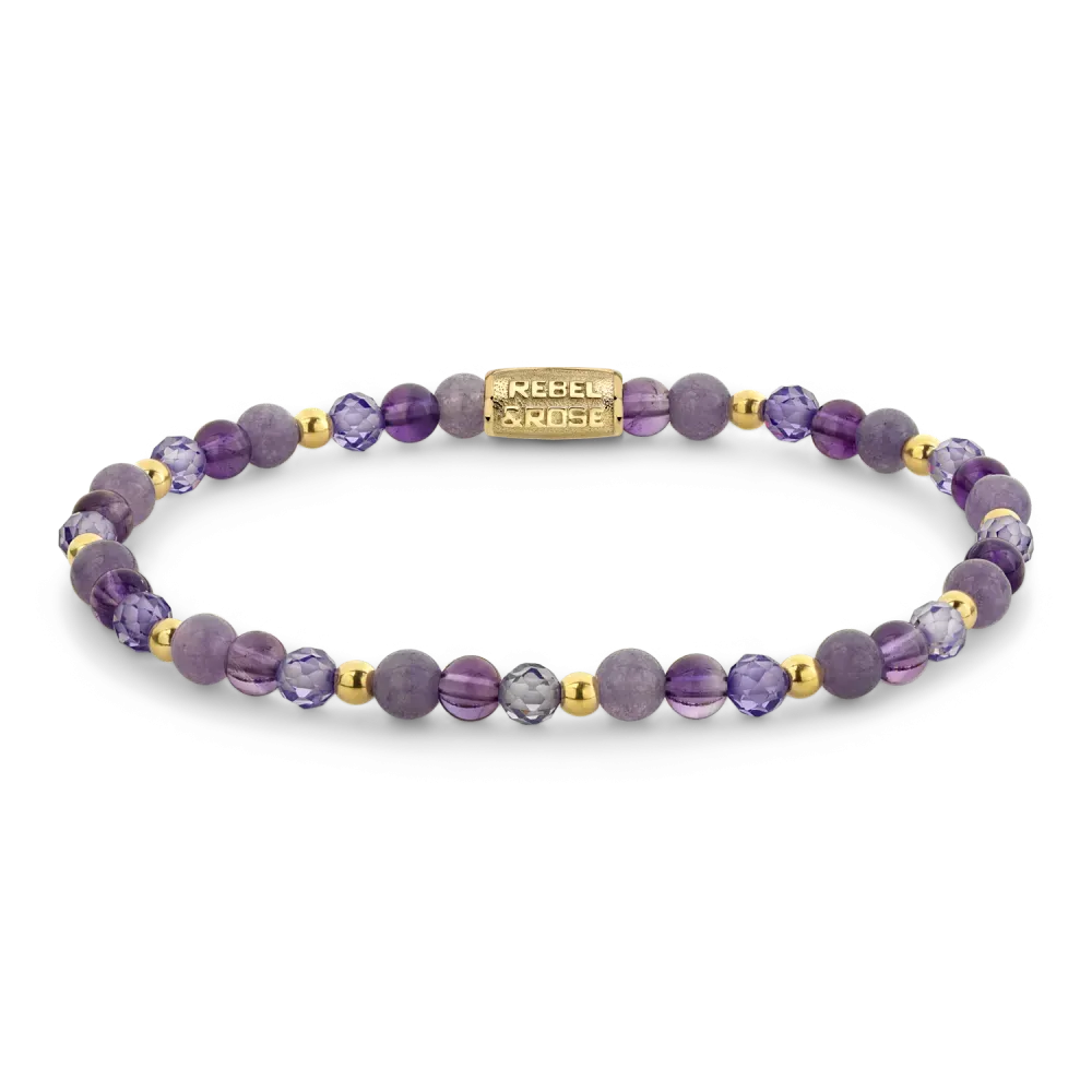 Bracelet en perles violettes avec des accents dorés.