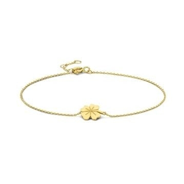Bracelet en or 9 carats avec un motif de trèfle.