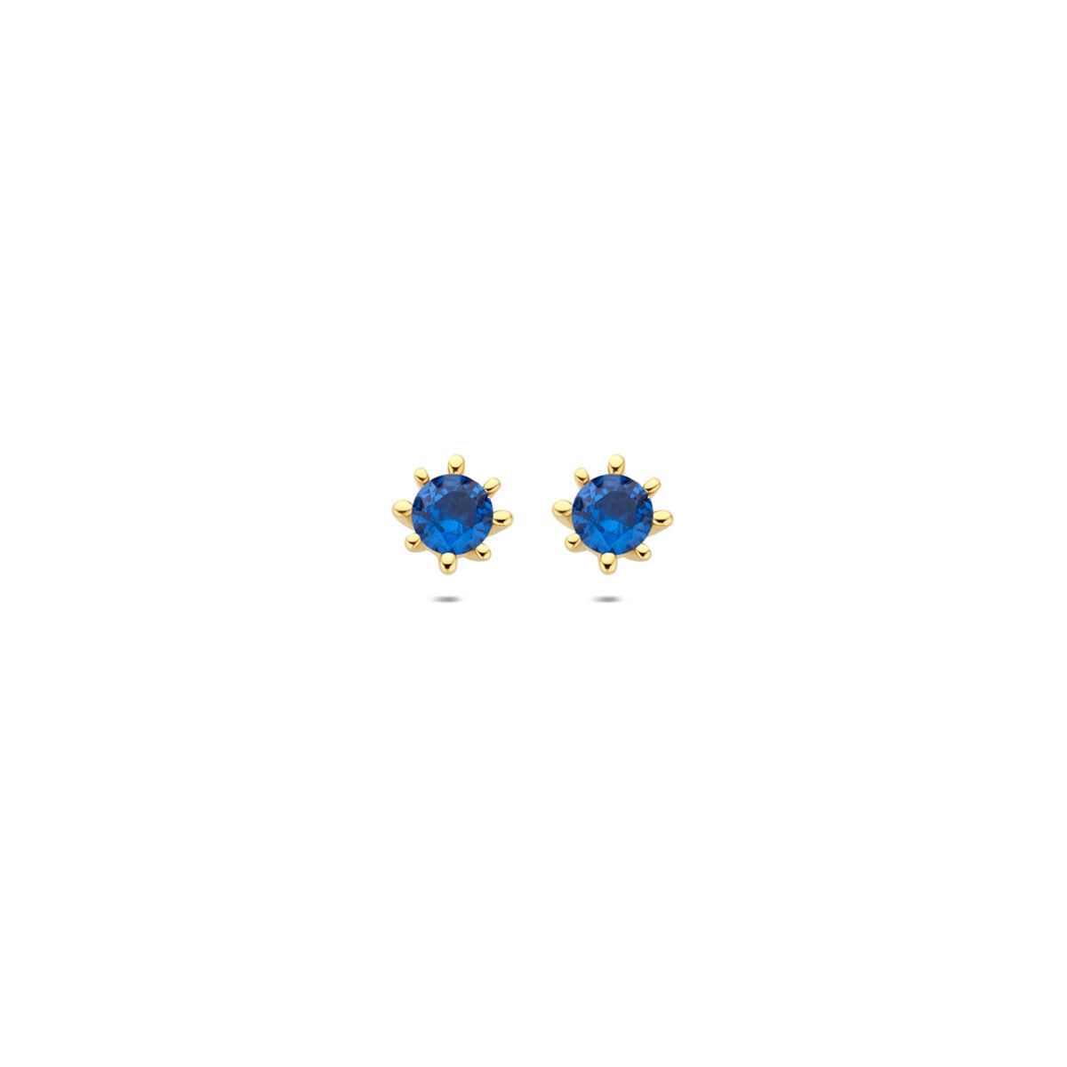 Boucles d'oreilles en or jaune 9 carats avec des zircones bleues.