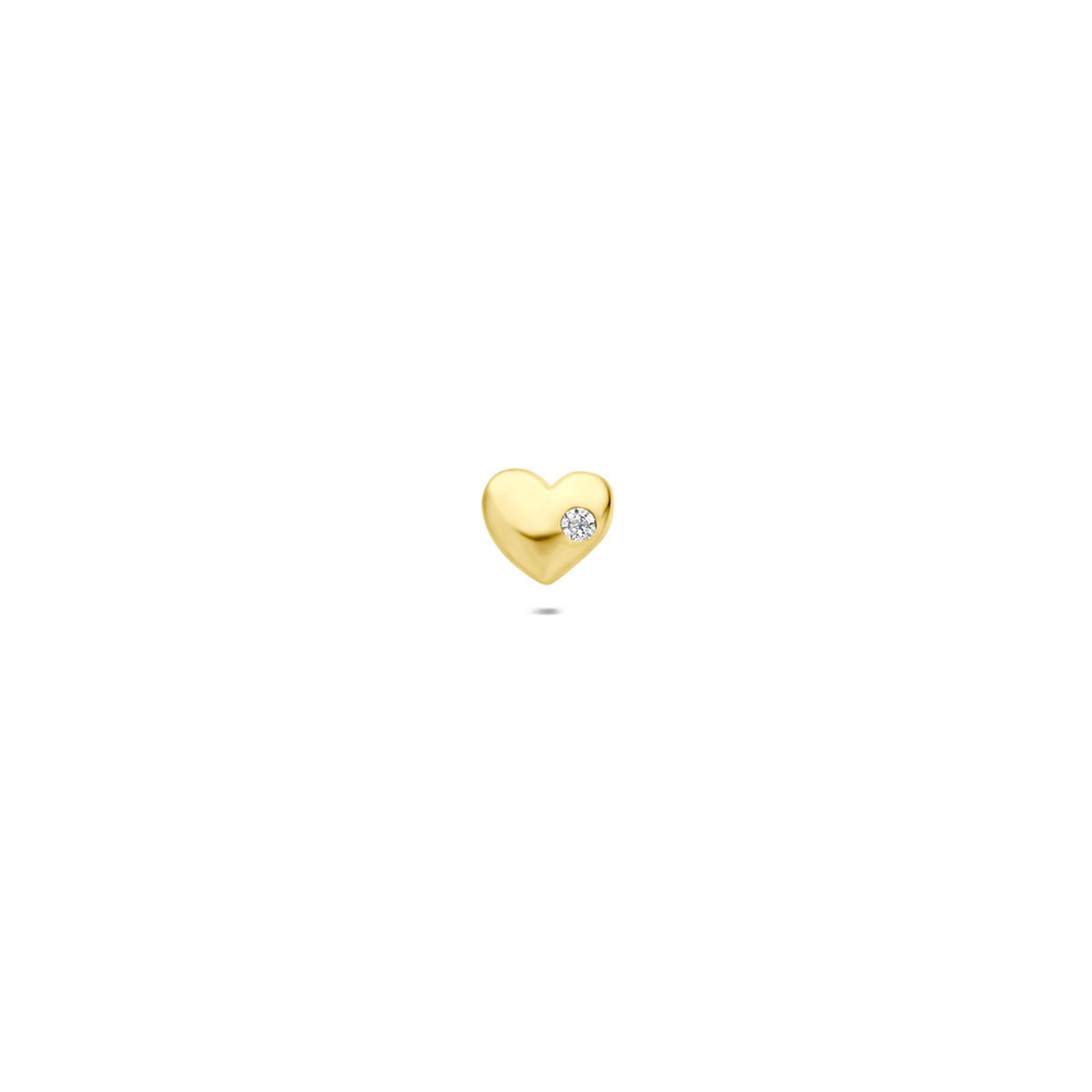 Piercing en or en forme de cœur avec une zirconia.