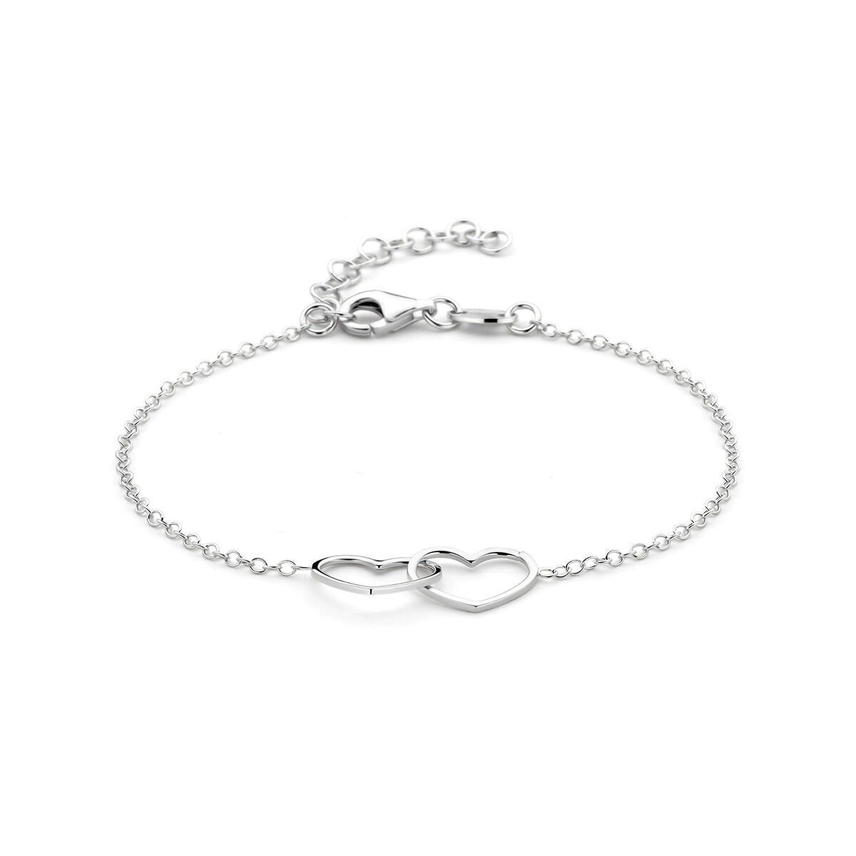 Bracelet en argent rhodié avec deux cœurs entrelacés.
