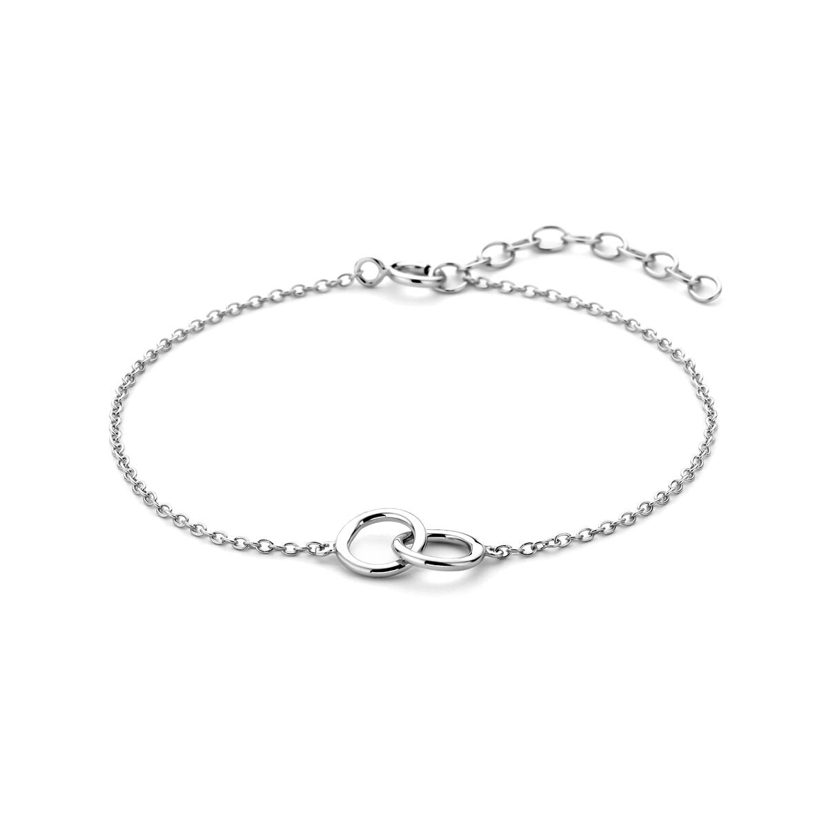 Bracelet argenté avec des cercles, finition rhodiée, design délicat et chaîne ajustable.