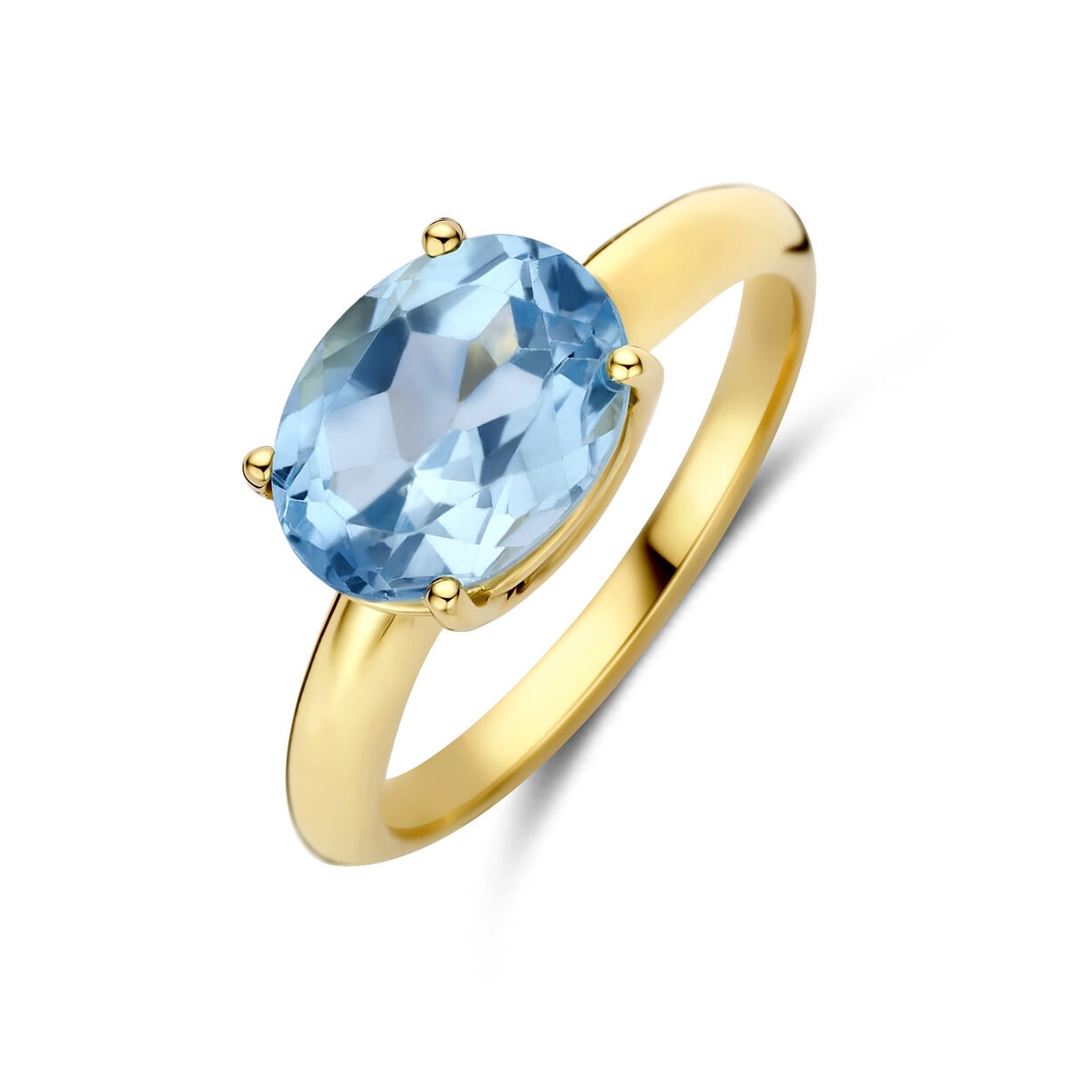 Bague en or jaune 14 carats avec topaze bleue ovale.