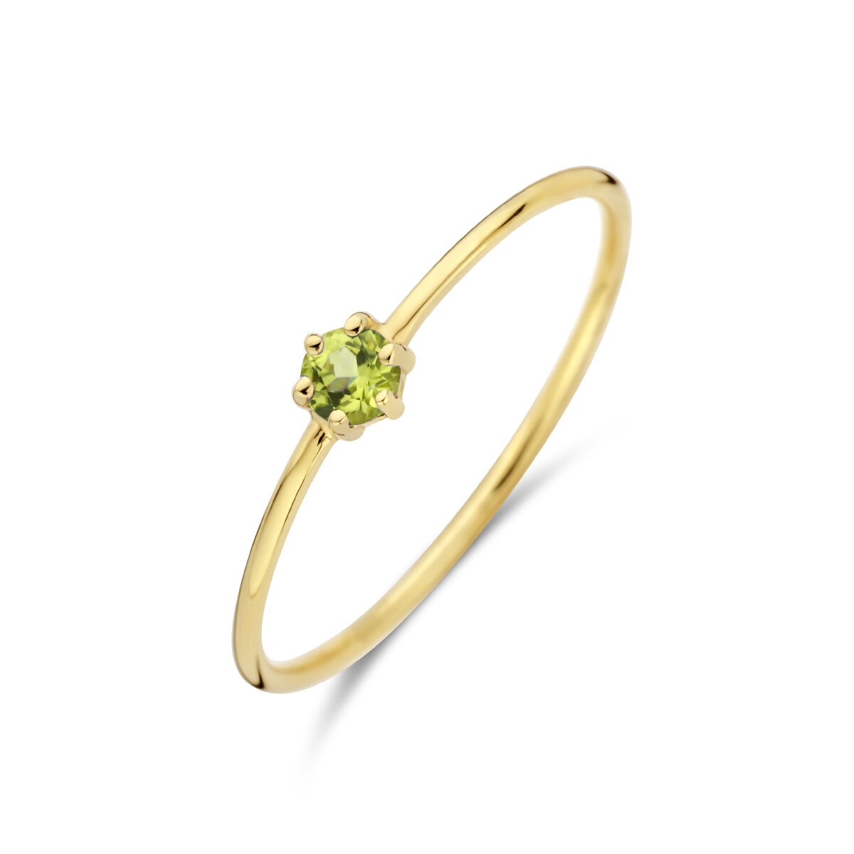 Bague en or jaune 14 carats avec un péridot taillé en brillant.
