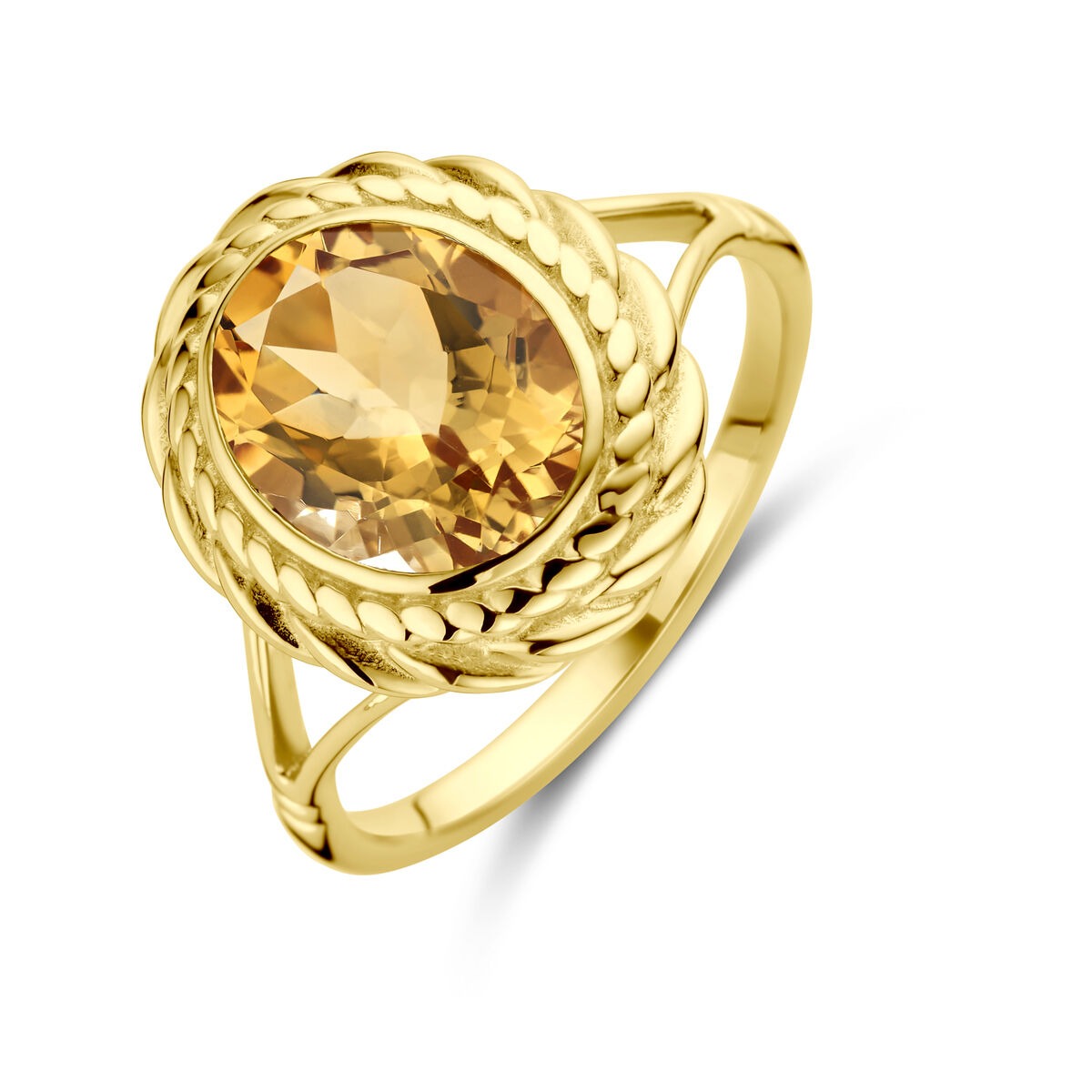 Bague en or 14 carats avec un citrine en forme de briolette, sertie dans un design tressé.