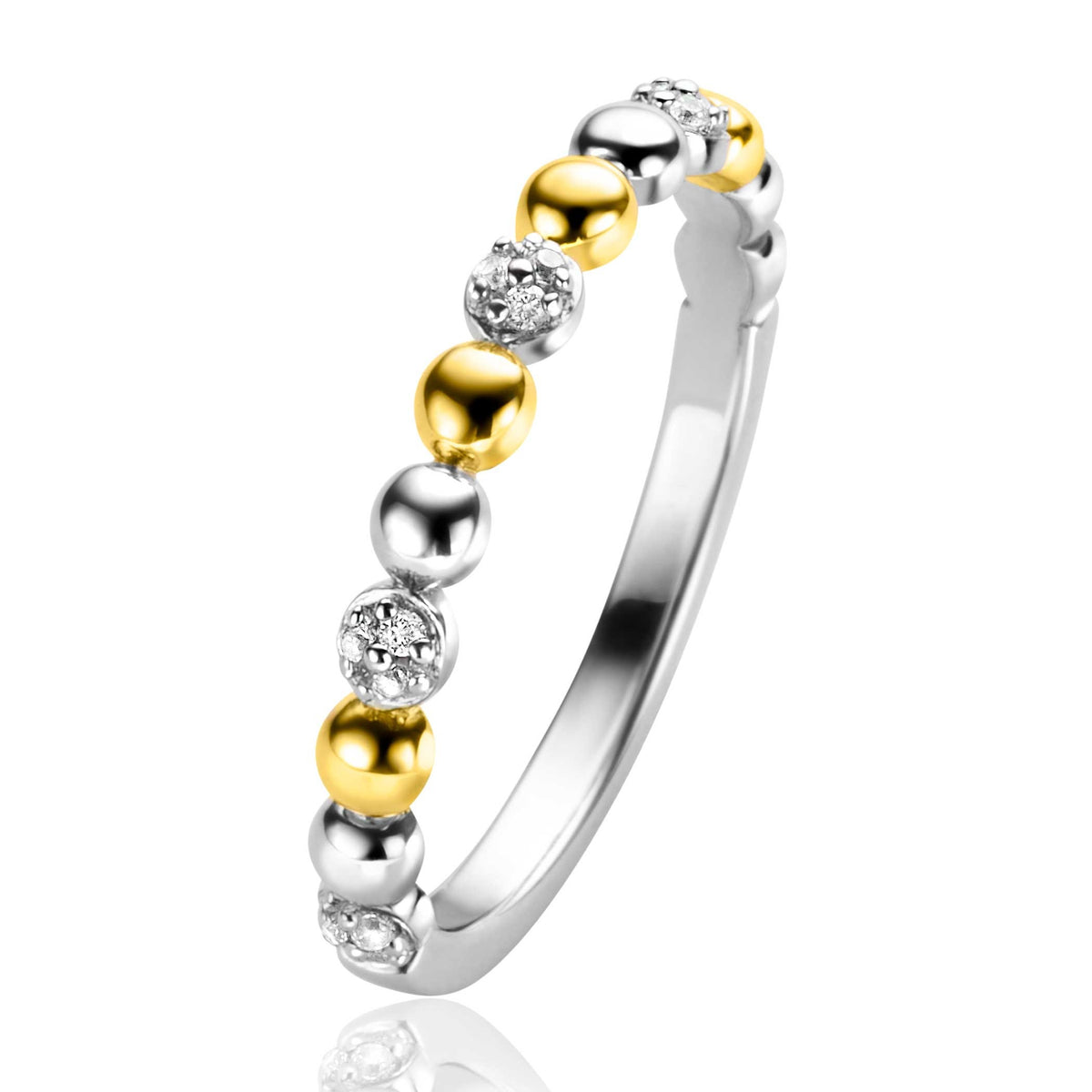 Zilveren ring met vergulde en zilveren bolletjes, versierd met heldere steentjes.