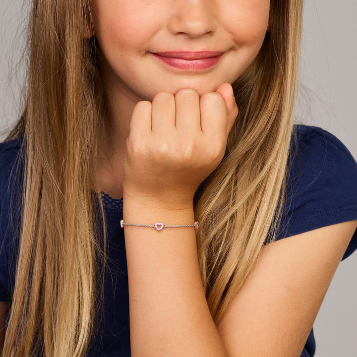 Gerhodineerd zilveren kinderarmband met roze hartjes