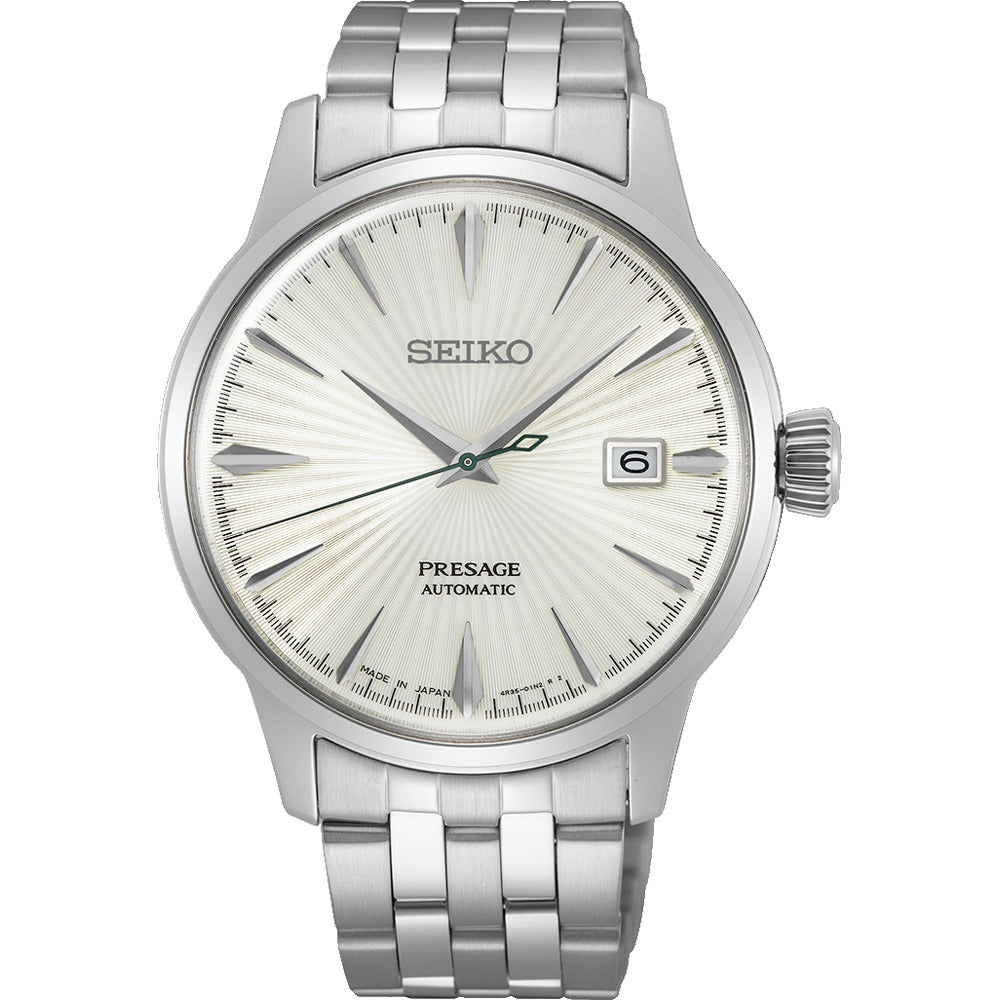 Montre homme Seiko automatique avec cadran argenté, bracelet en acier inoxydable et dateur.