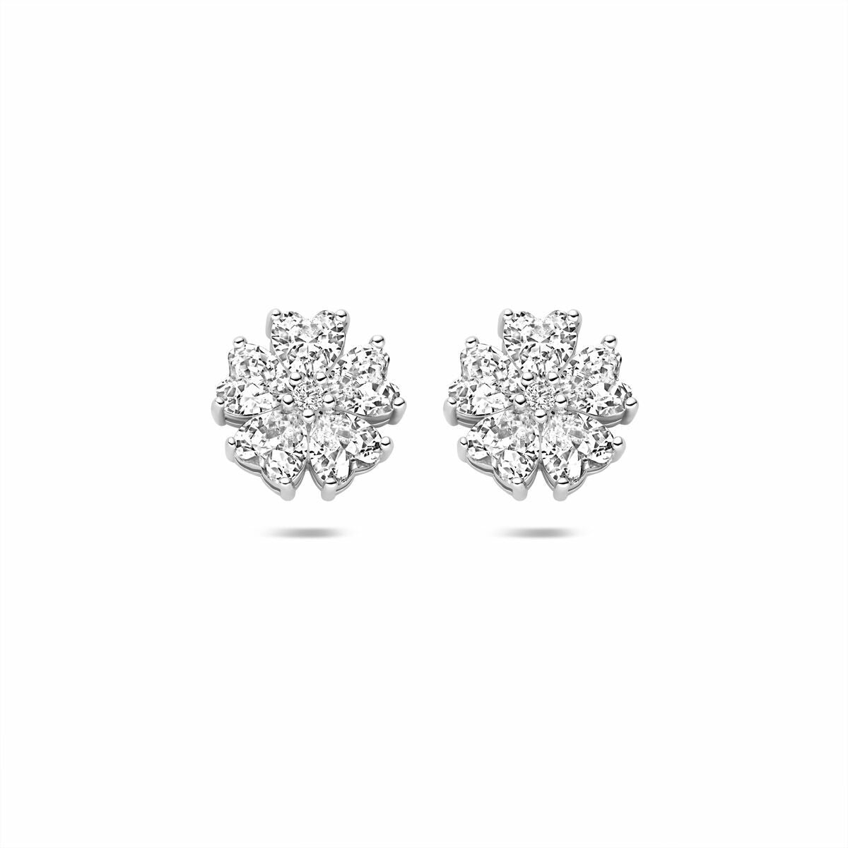 Boucles d'oreilles en argent rhodié ornées de zirconiums en forme de fleur.