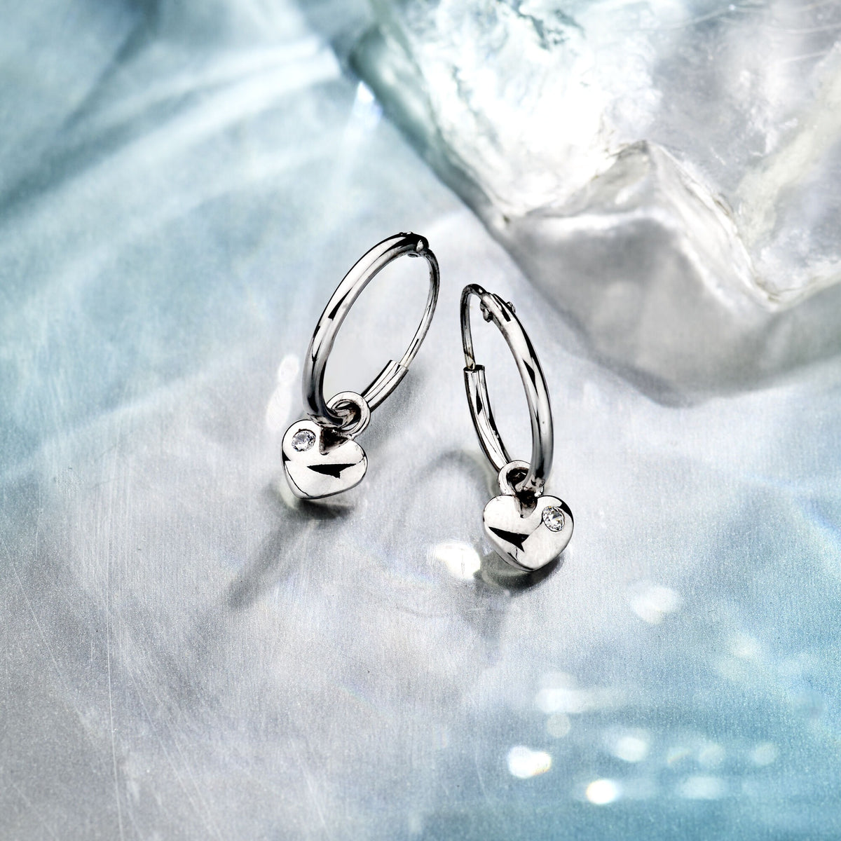 Créoles en argent avec cœur et zircone – rhodié