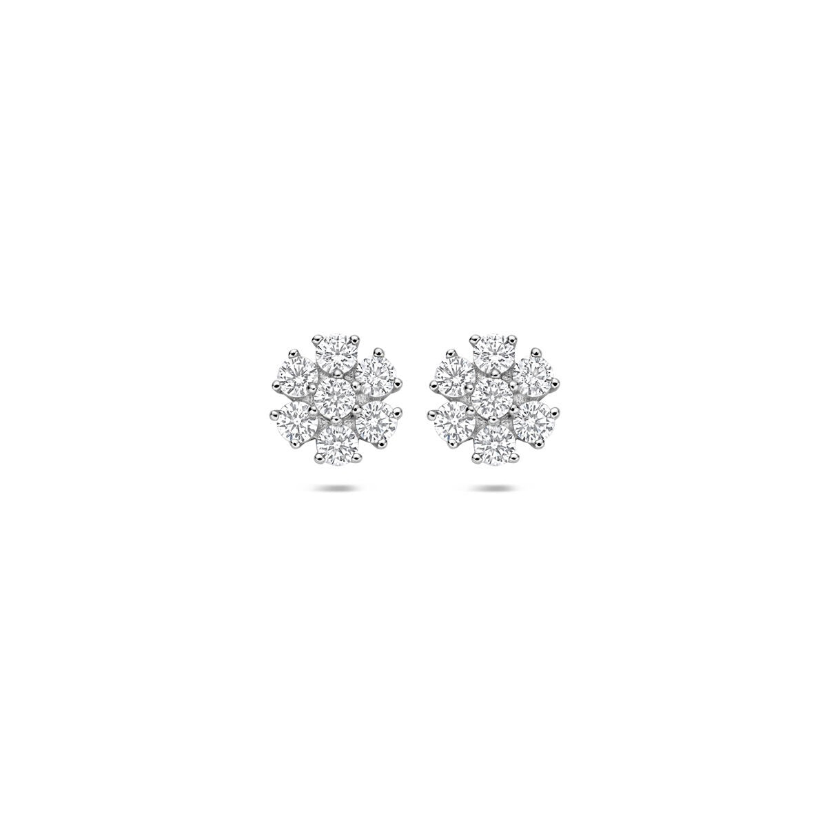 Boucles d'oreilles en argent rhodié en forme de fleur, ornées de zirconiums.