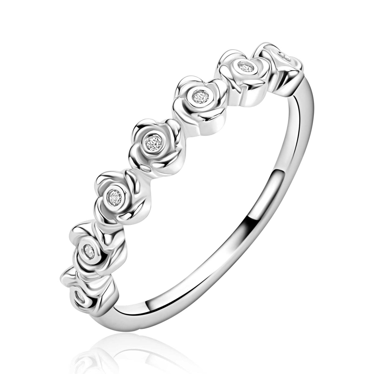 Bague en argent avec des fleurs en relief et des zirkonia.
