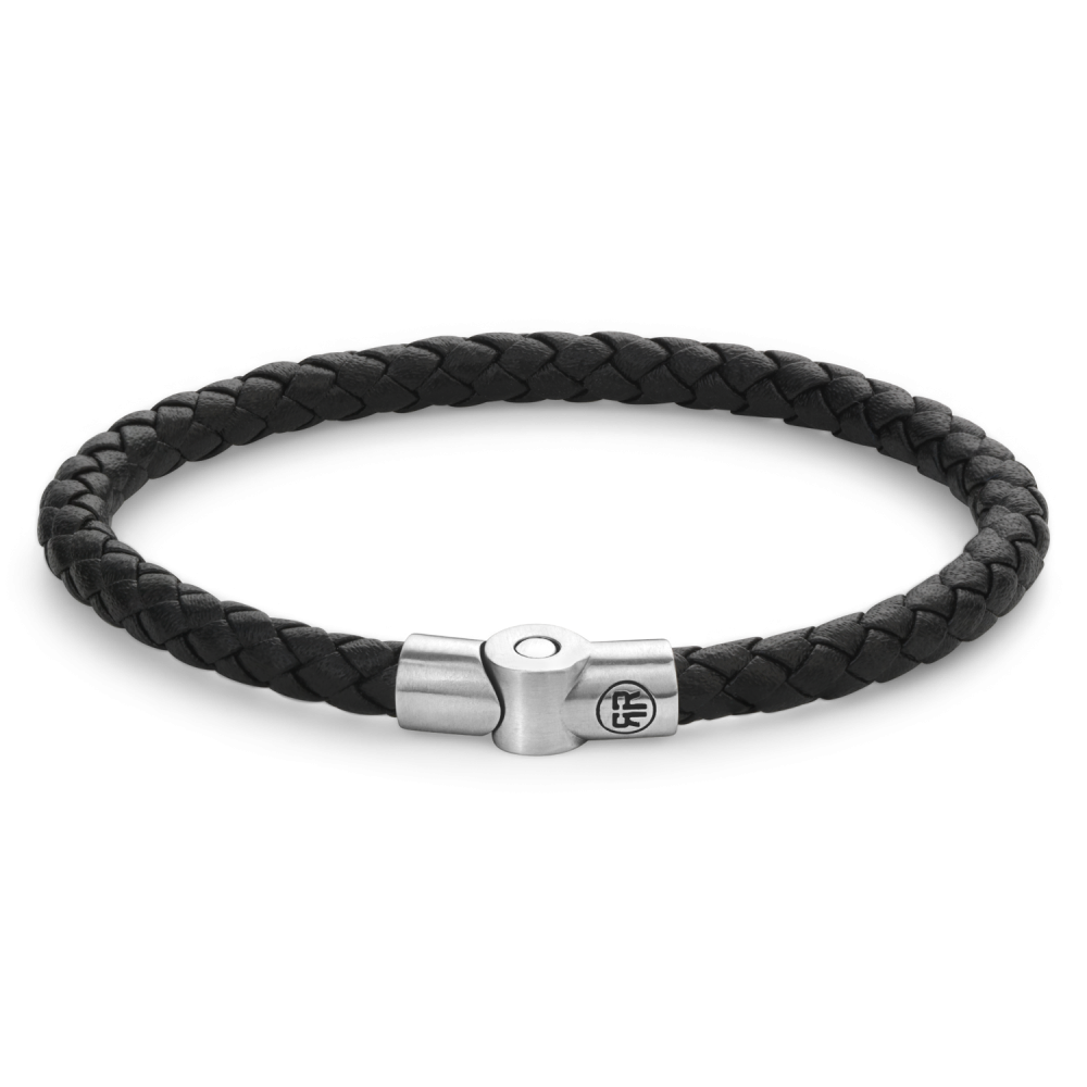 Bracelet en cuir tressé noir avec fermoir en métal argenté.