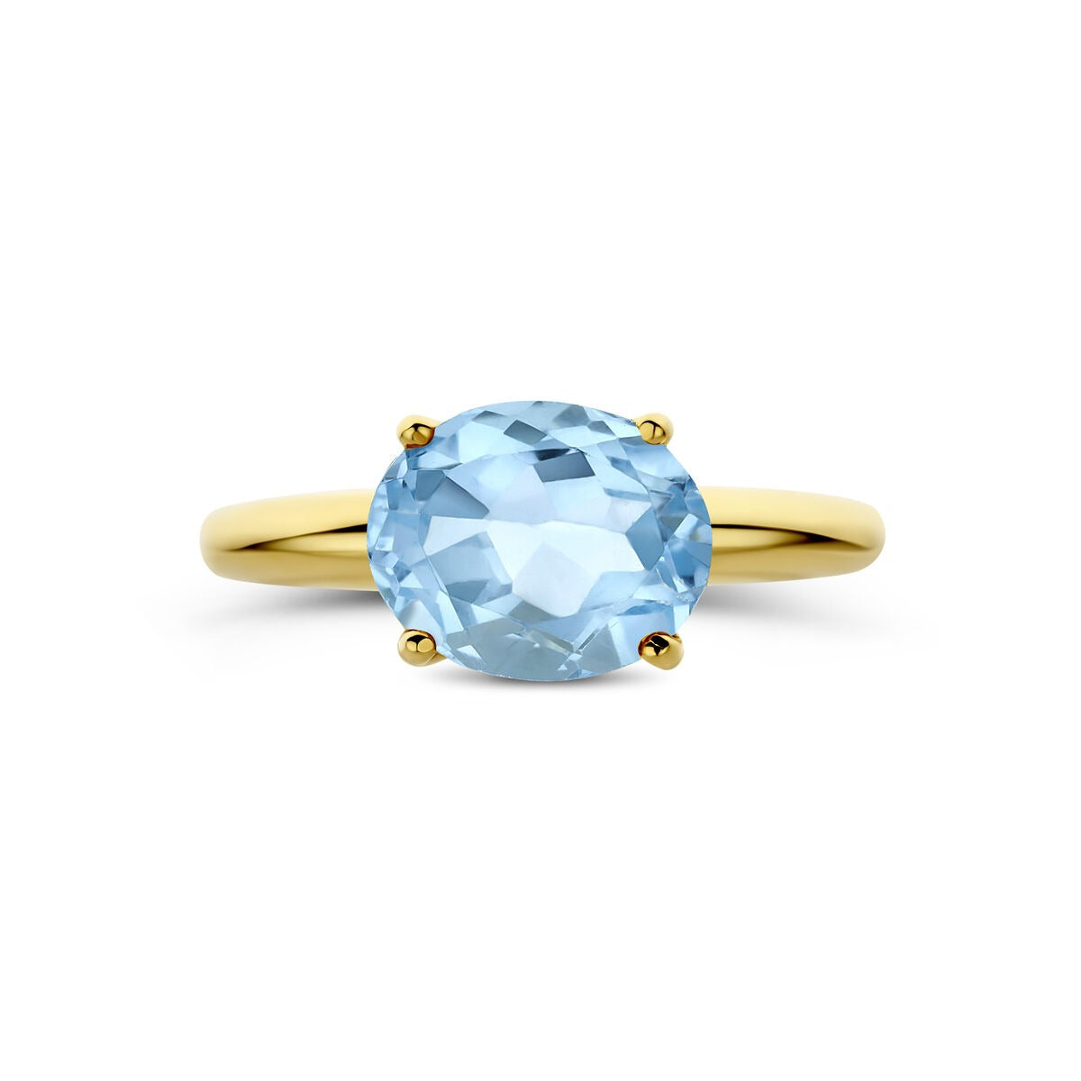 bague en or jaune 14k avec topaze bleue