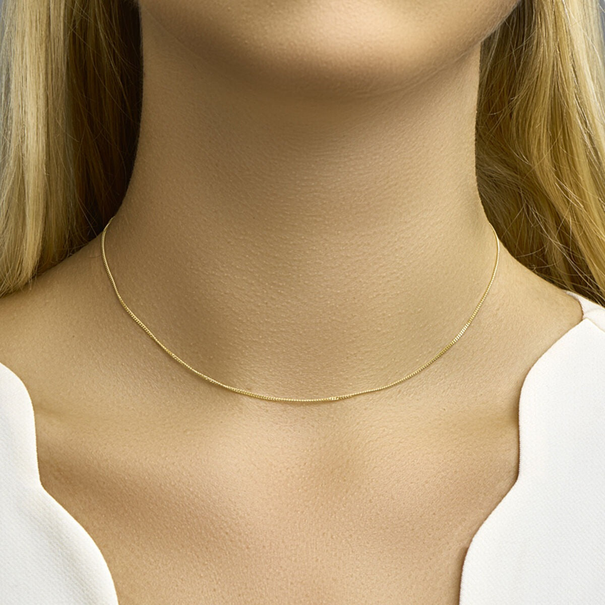 Collier en or jaune 18k avec maille gourmette