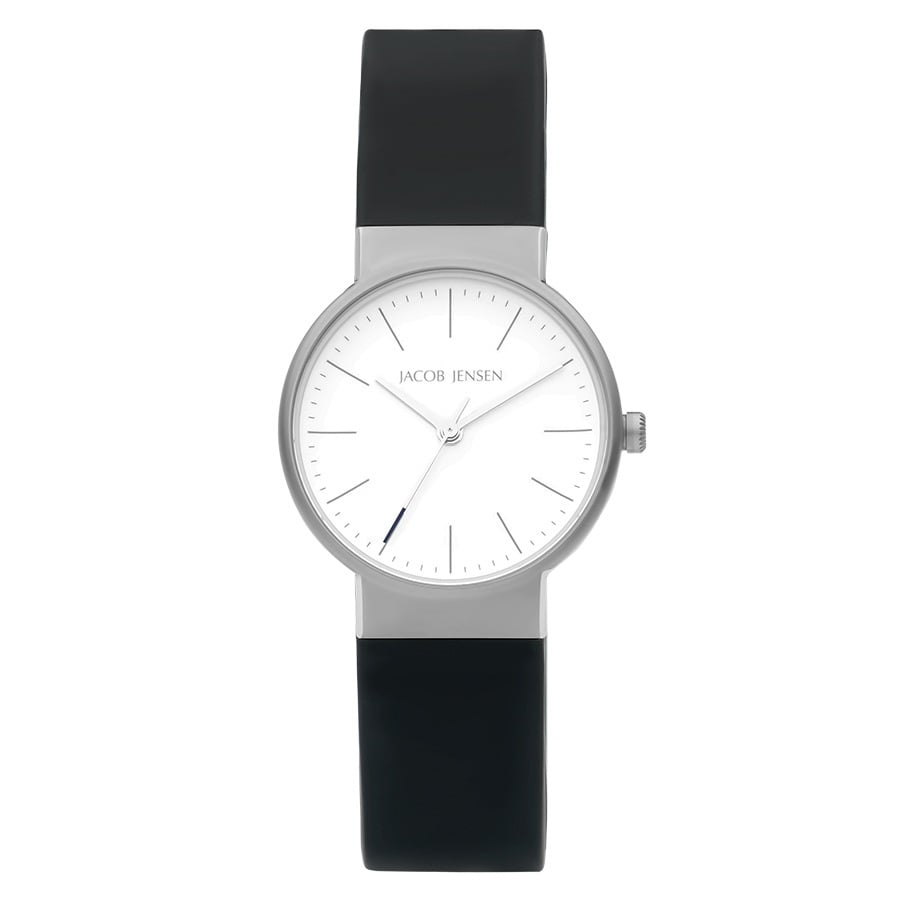 Montre avec boîtier argenté, cadran blanc et bracelet en silicone noir.