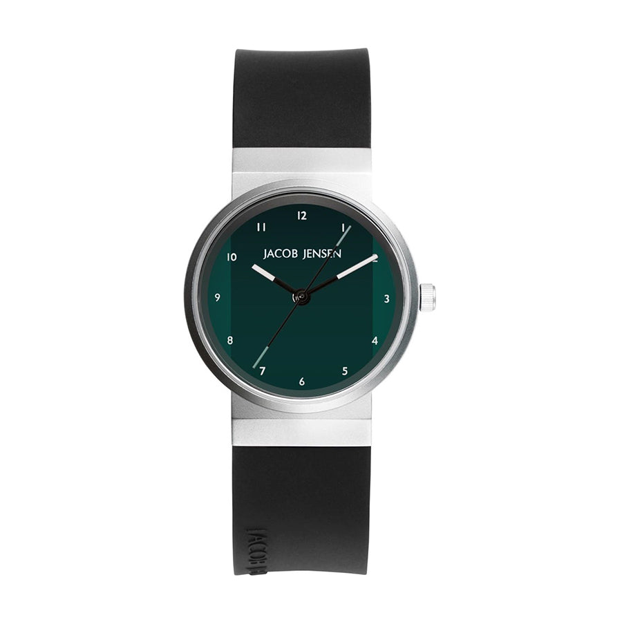 Montre avec boîtier en acier inoxydable, cadran vert et bracelet en silicone noir.