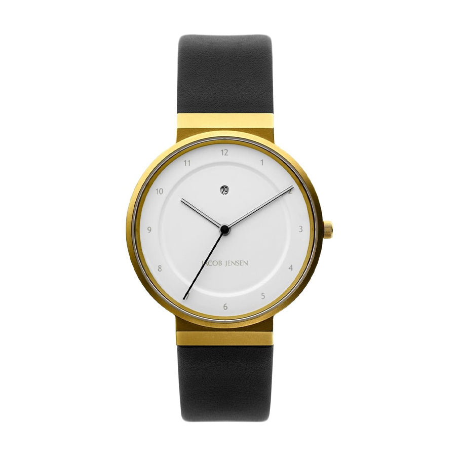 Montre avec boîtier doré, cadran blanc et bracelet en silicone noir.