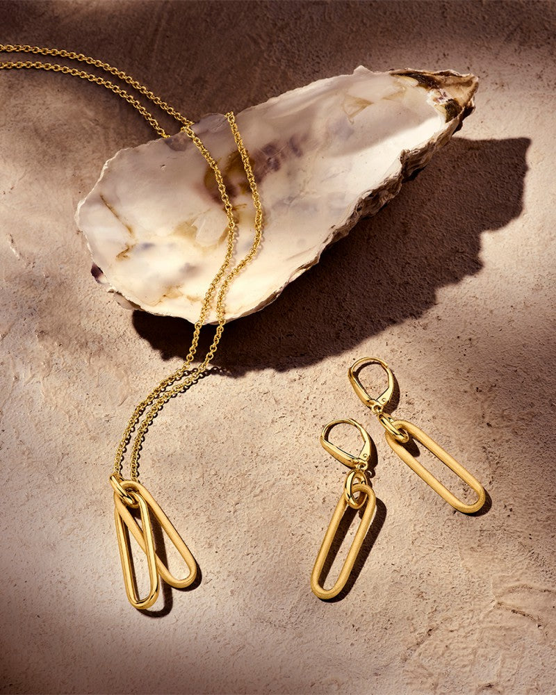 Boucles d'oreilles en or jaune frappantes avec des éléments en or mat - Luxe 14 carats pour femme