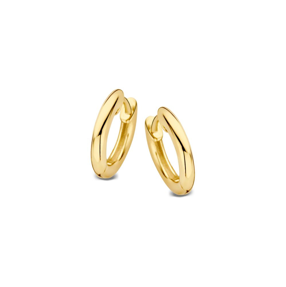 Boucles d'oreilles en or jaune 14 carats, de forme ovale et lisse.