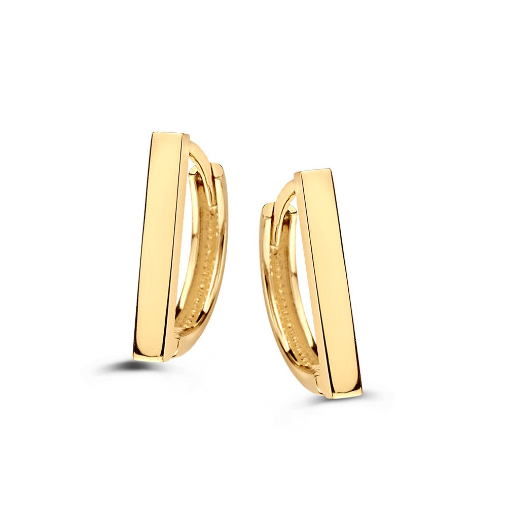 Boucles d'oreilles en or jaune au design ludique et intemporel.