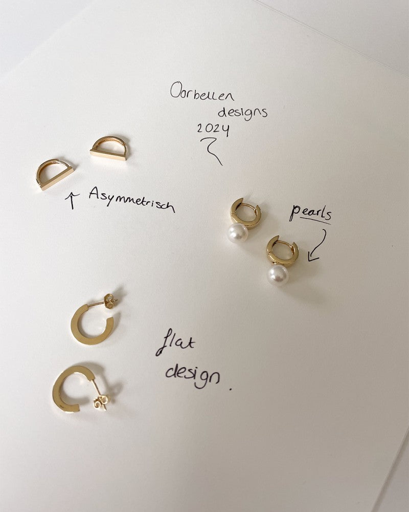 Créoles en or jaune au design ludique – Élégance intemporelle