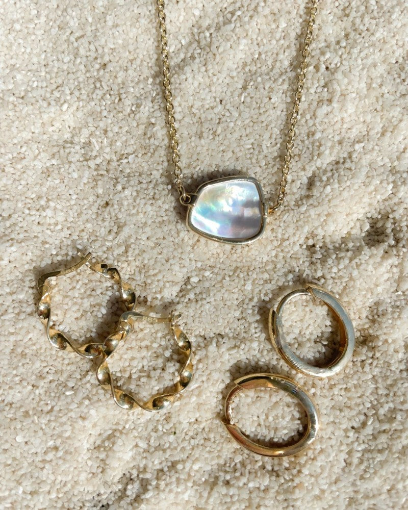 Créoles en Or Jaune Ovale – 14 Carats Or | Van der Kooij