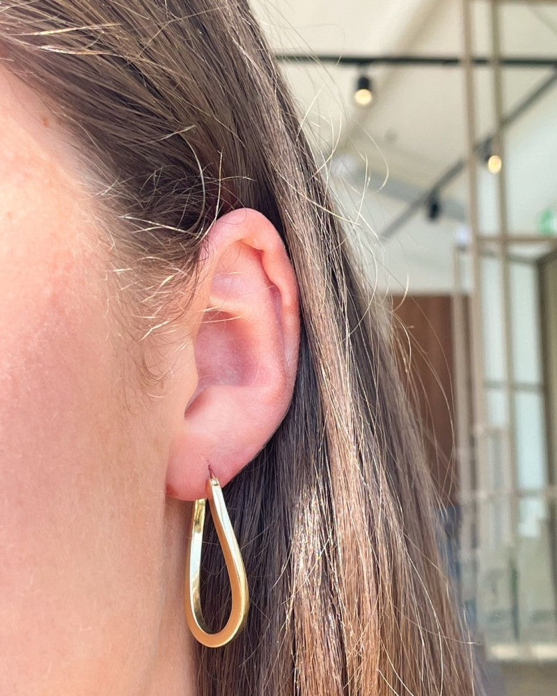 Créoles en or jaune avec une touche ludique – or 14 carats