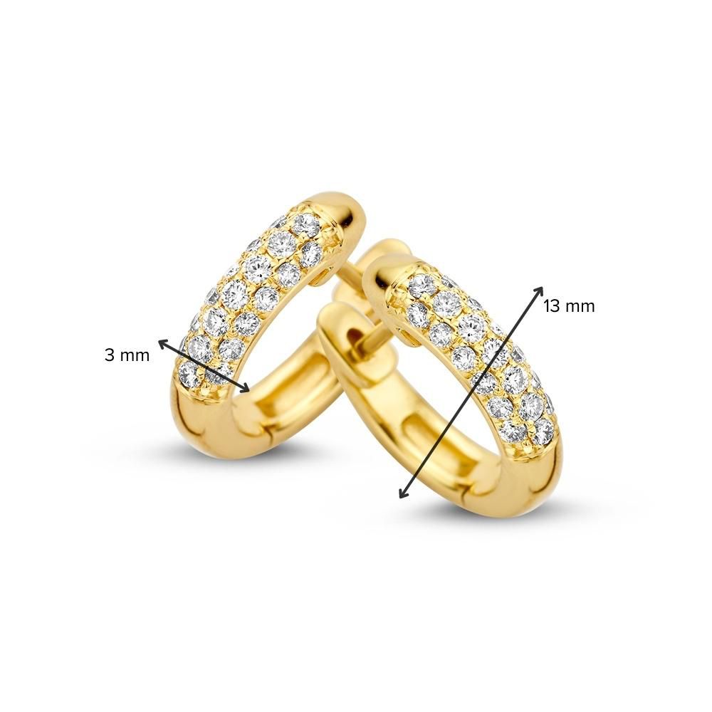 Créoles en or jaune avec diamant : élégance intemporelle et éclat 0,32 crt.