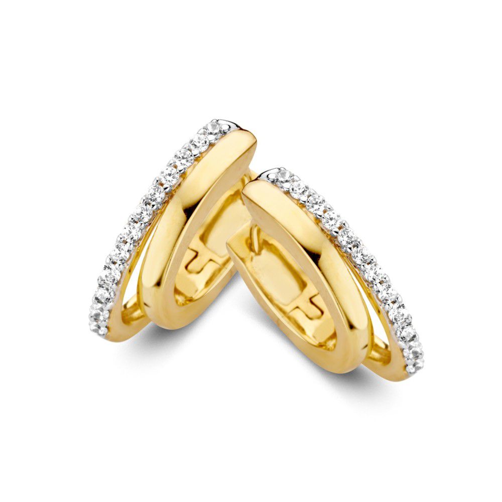 Boucles d'oreilles en or 14 carats avec des bandes asymétriques et des zirconiums.