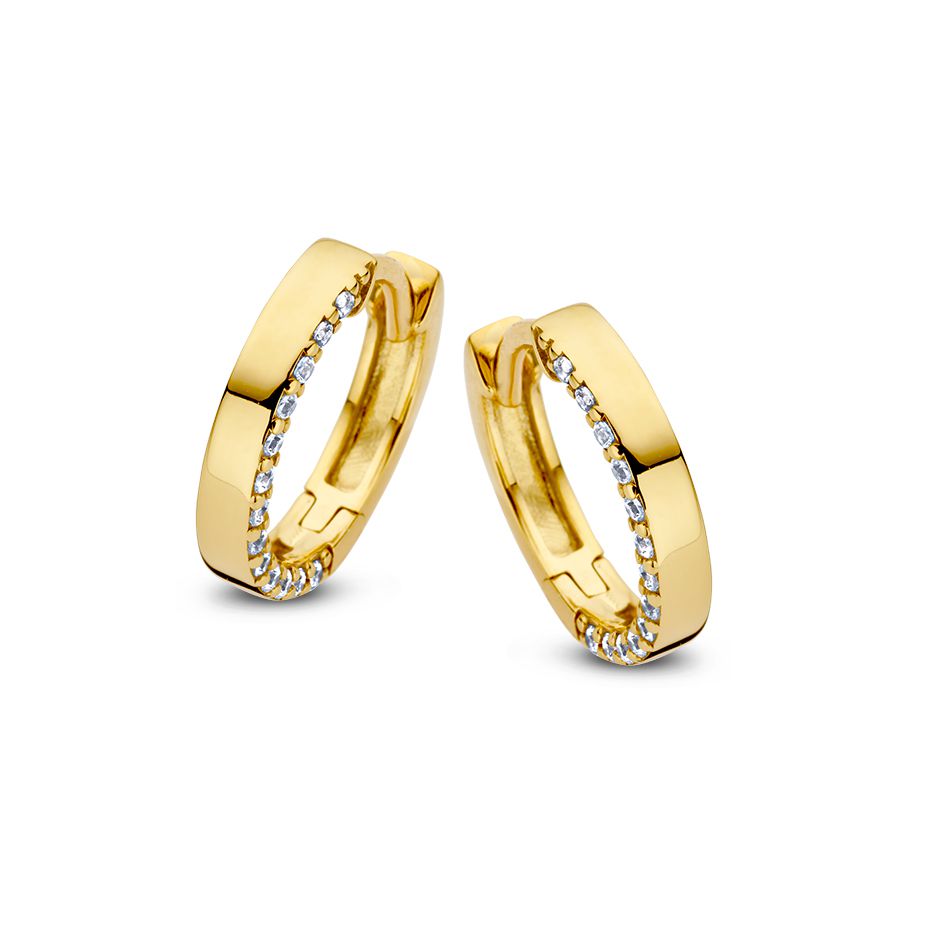 Boucles d'oreilles en or jaune brillant avec des zirconias, forme ronde et finition lisse.