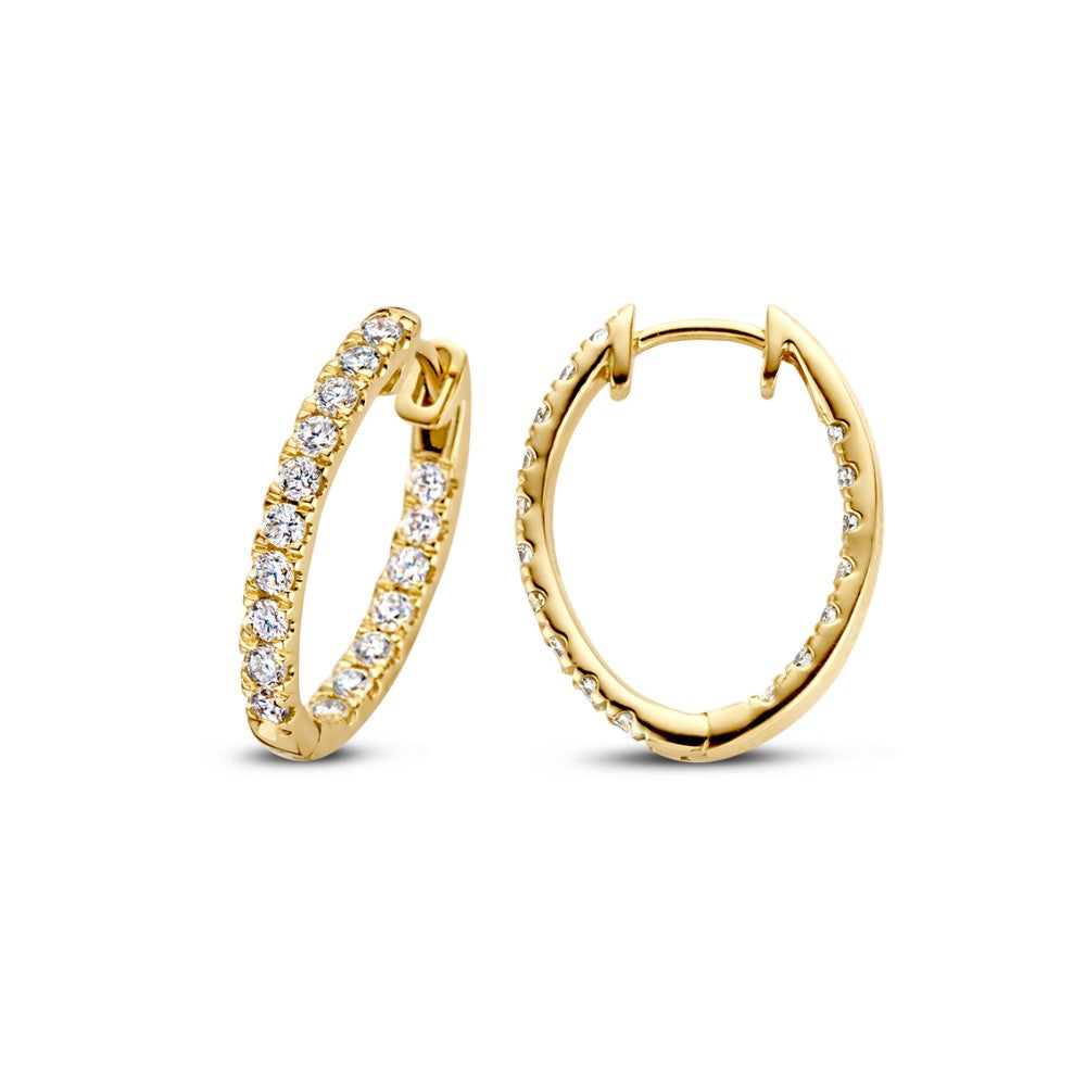Boucles d'oreilles en or jaune avec des zircons, en forme de créoles.