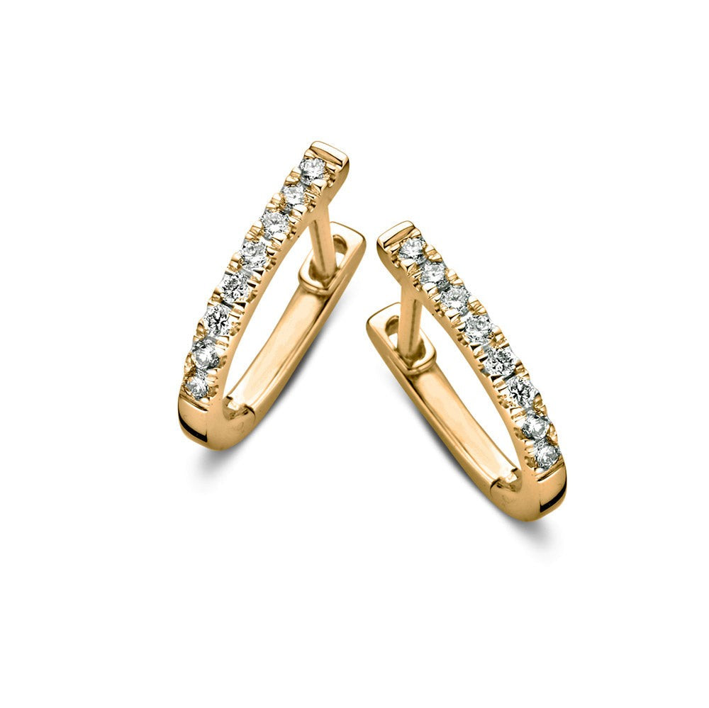 Boucles d'oreilles en or jaune avec des zircons, en forme de courbe élégante.