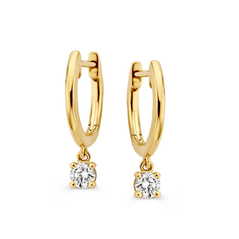Boucles d'oreilles en or jaune avec des pendentifs en diamant de 0,30 crt.
