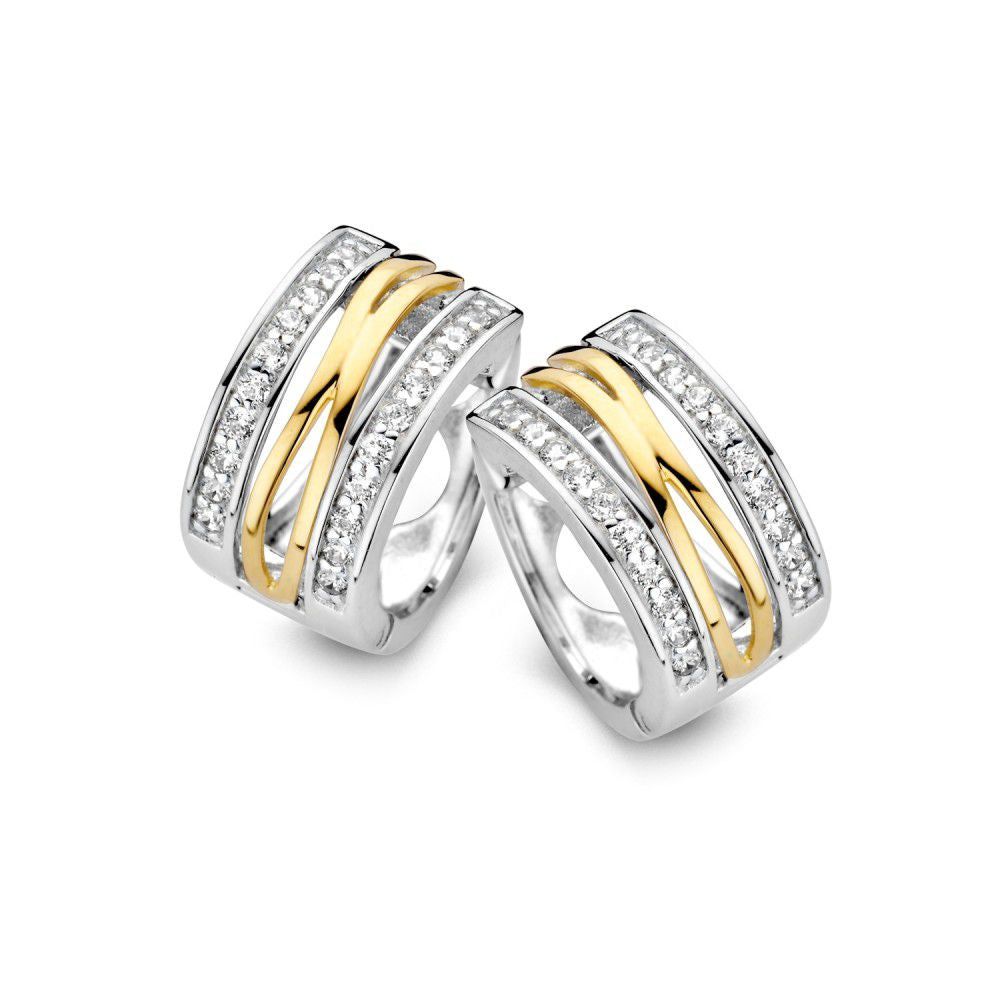 Boucles d'oreilles élégantes en argent et or avec zirconiums, diamètre de 12 mm.