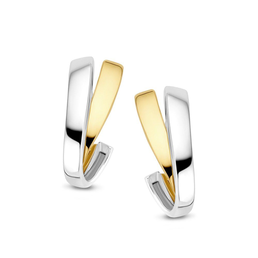 Bague en or jaune et blanc, sans pierre, avec un design moderne et ouvert.