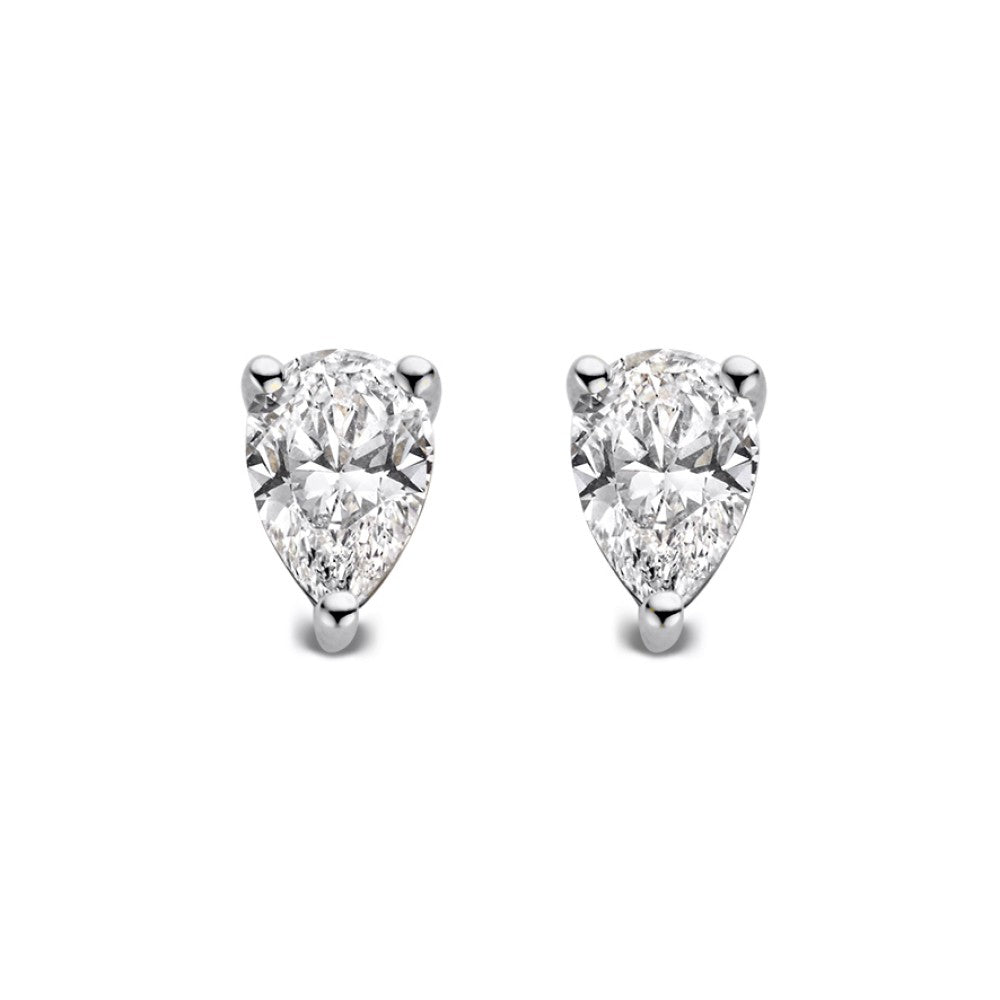Boucles d'oreilles en or blanc avec des diamants en forme de poire.