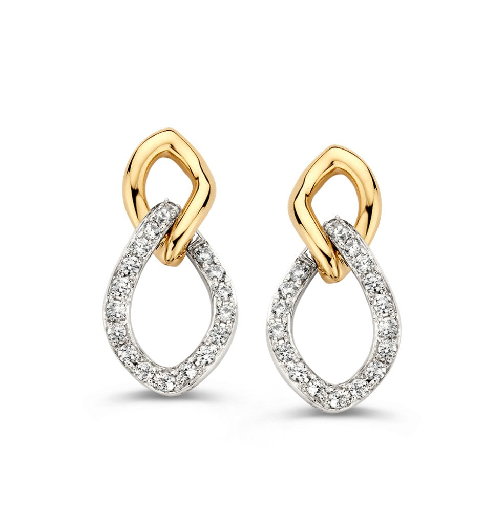 Boucles d'oreilles bicolores en or blanc et or jaune avec des zircons, en forme de goutte.