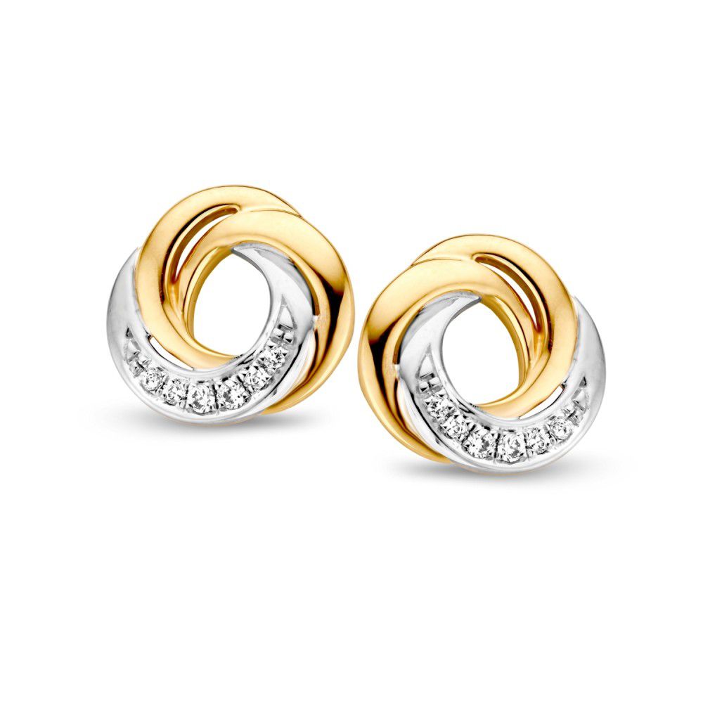 Boucles d'oreilles en or jaune et blanc avec des diamants brillants, design en spirale.