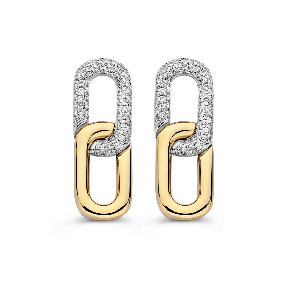 Boucles d'oreilles bicolores en or avec 0,30 ct de diamants brillants.