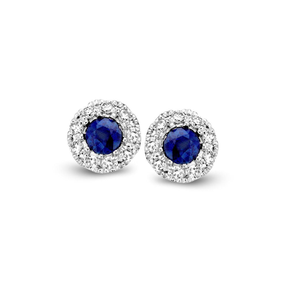 Boucles d'oreilles bicolores en or avec saphir central et diamants autour.