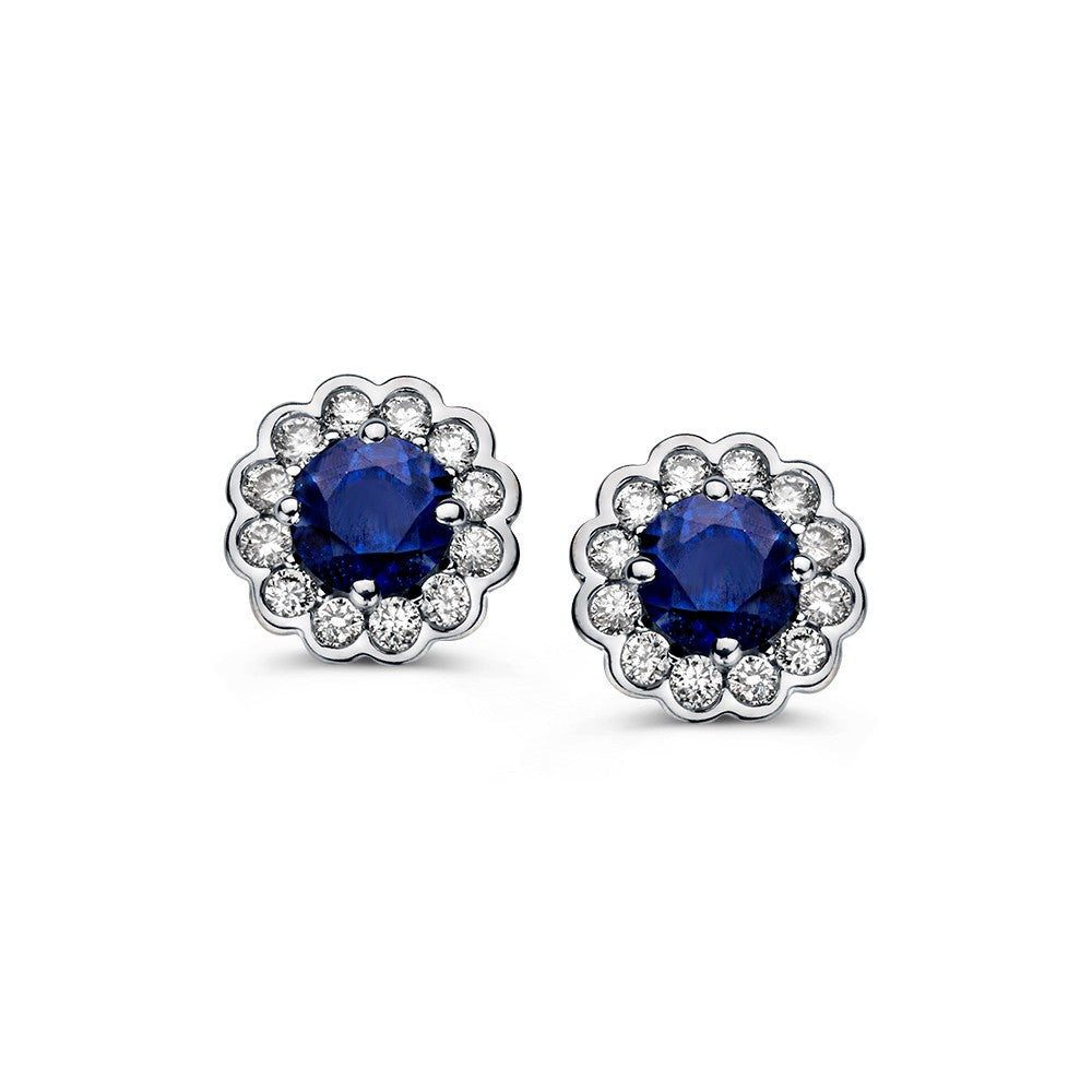 Boucles d'oreilles en or jaune avec saphir et diamants de 0,66 ct en sertissage entourage.