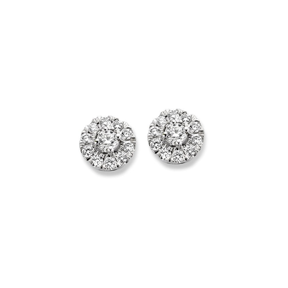 Boucles d'oreilles en or blanc ornées de diamants, forme ronde avec un design floral.
