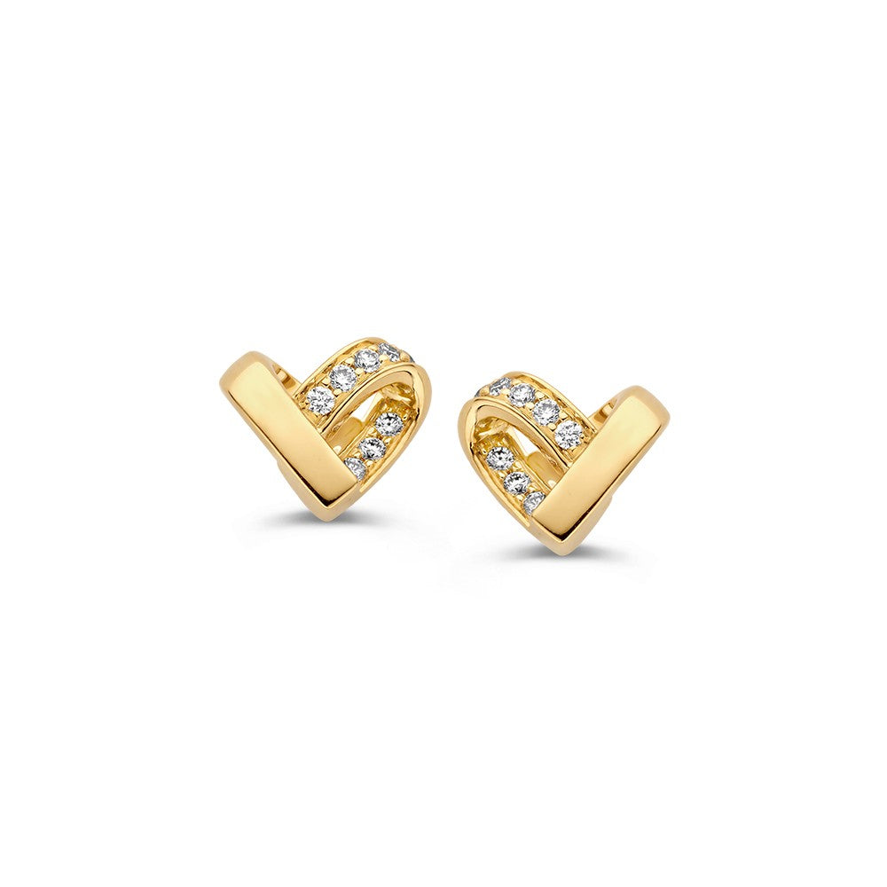 Boucles d'oreilles en or jaune en forme de cœur avec des diamants, finition brillante.